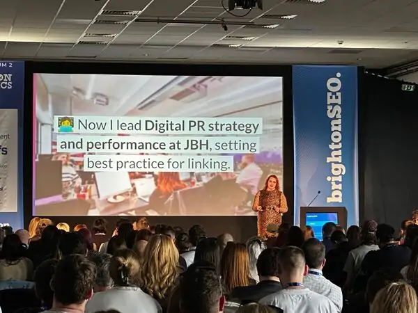 Lauren on stage speaking at BrightonSEO